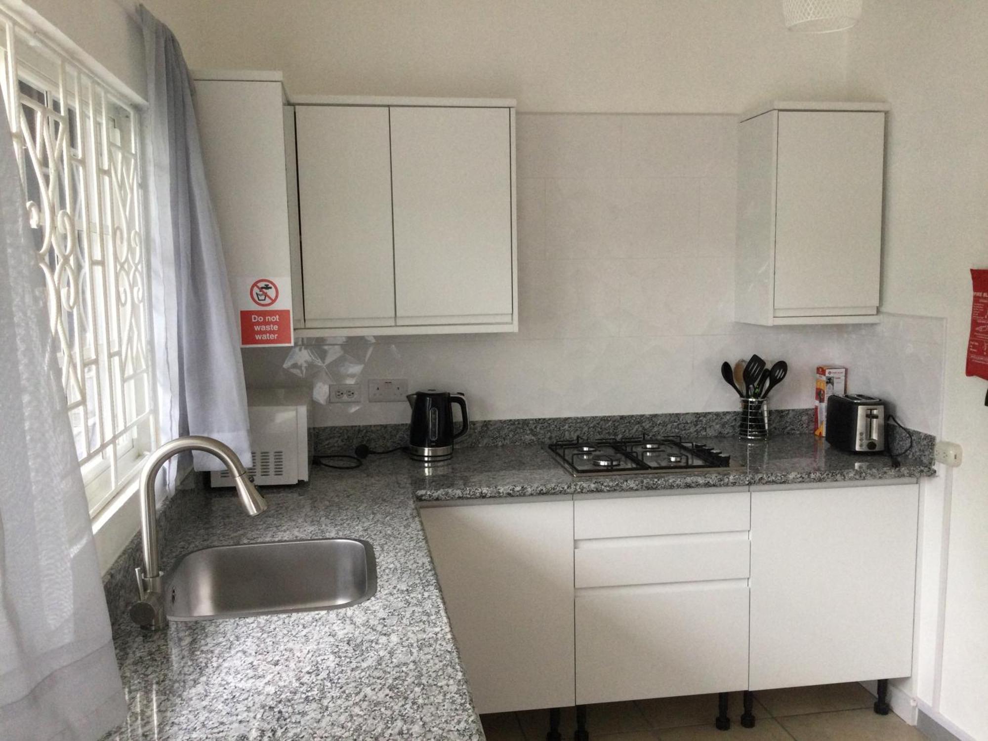Apartamento Housesleeps3-Seaview-Ac-Parking-2Br-Nearbluelagoon *