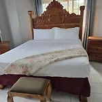 Poinciana House